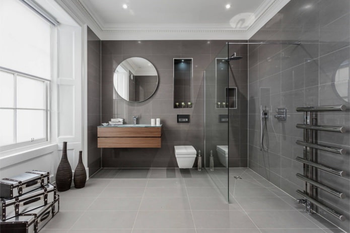 интерьер ванной в современном стиле с серой плиткой прямоугольной формы