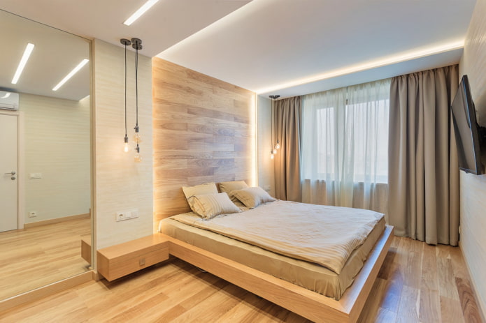 деревянная кровать без спинки в интерьере