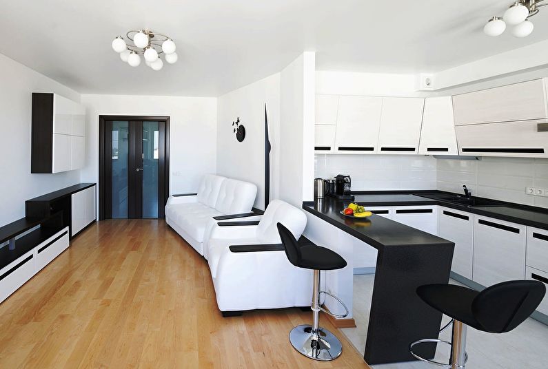 Дизайн интерьера гостиной в черно-белых тонах - фото
